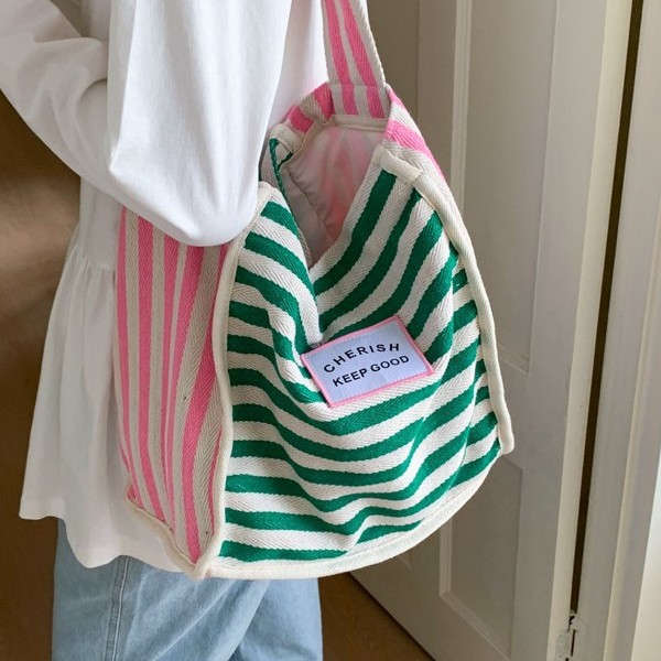 Fashionable striped color-blocking bag, new spring trendy, casual and versatile, large-capacity single-shoulder bag, striped canvas bag full figure