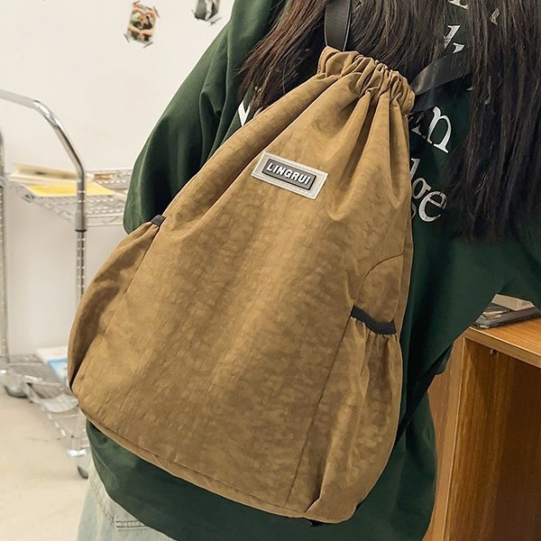 Niche design men's and women's commuting casual backpacks, large-capacity outdoor bags, class bags, trendy and cool series couple backpacks Application Scenario