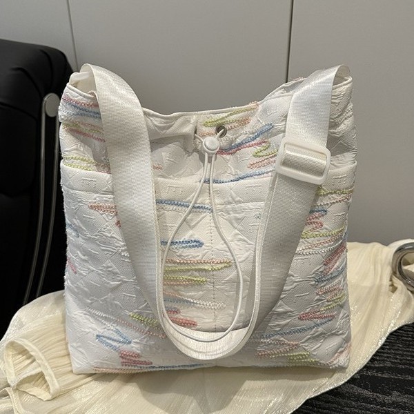 Spring/Summer 2025 niche trendy Nylon fabric colorful thread bag, casual Japanese style, versatile, large-capacity single-shoulder crossbody dumpling bag Application Scenario