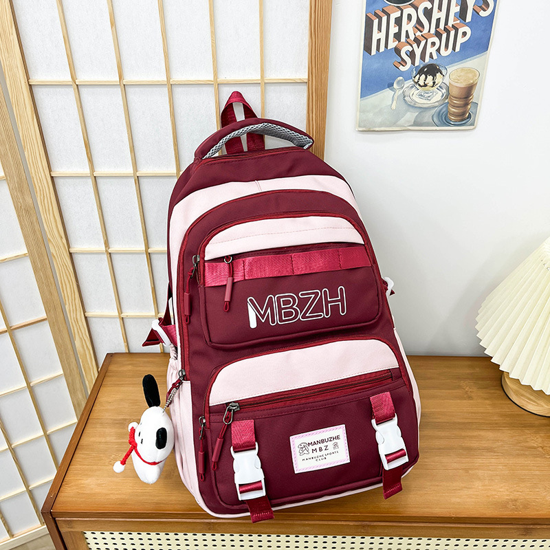 The new schoolbag is a large-capacity backpack for girls in junior and senior high school, and a color-matched backpack for students in grades three to six of primary school details Picture
