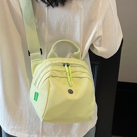 Backpack 2025 Spring/Summer New Women's bag, fashionable and casual nylon fabric bag, lightweight women's travel bag, solid color crossbody bag full figure