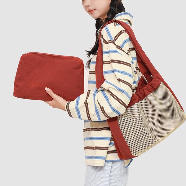 The 2025 new soft and lightweight hollowed-out mesh nylon women's bag is a casual, simple and fresh pull-out single-shoulder tote bag full figure