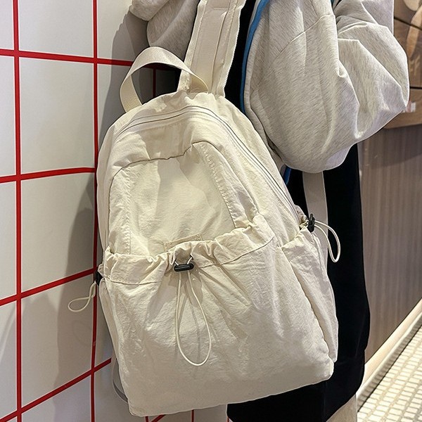 Nylon fabric backpack 2025 Summer New lightweight street trend men's and women's casual large-capacity travel bag Application Scenario