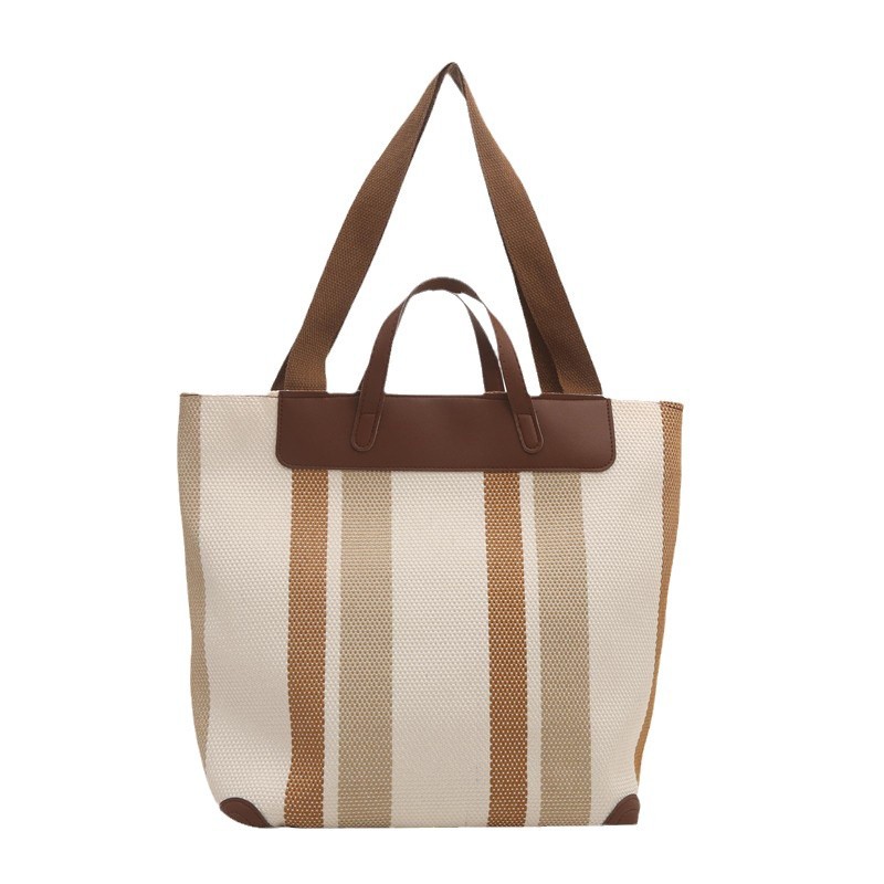A large-capacity commuting and casual 2024 autumn/winter new striped canvas trendy single-shoulder tote bag for travel Item Picture