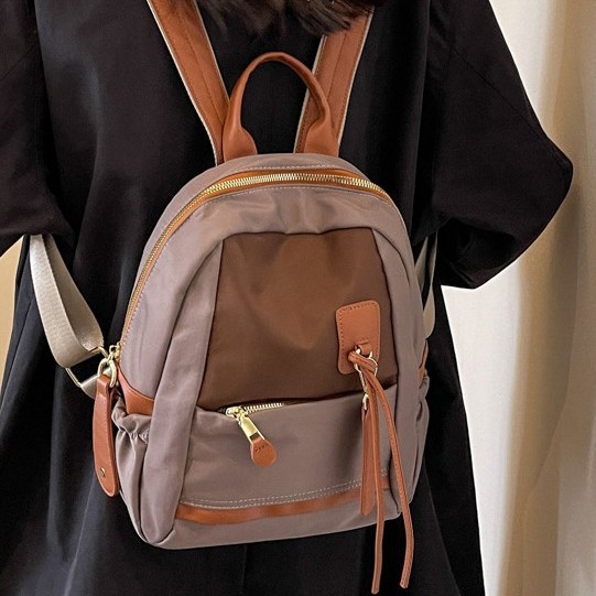 New autumn/Winter 2024 women's Korean version waterproof Oxford fabric small backpack, casual color-blocking travel bag full figure