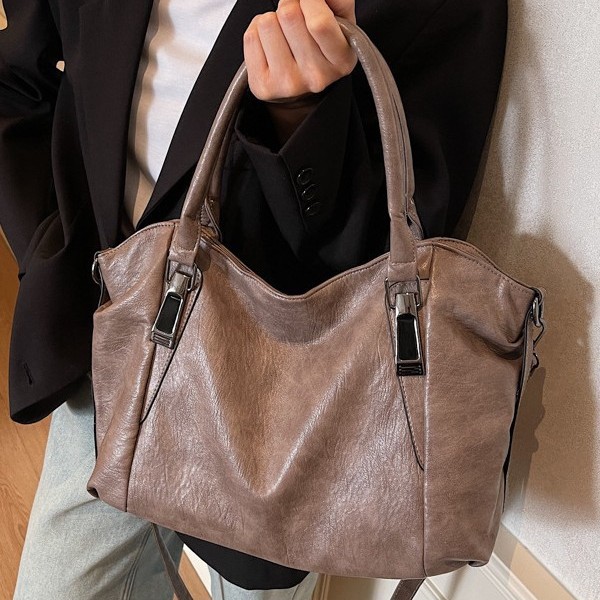 Single-shoulder, niche, simple lady's handbag with stitching, a popular single large-capacity tote bag under the armpits, a retro shoulder bag full figure