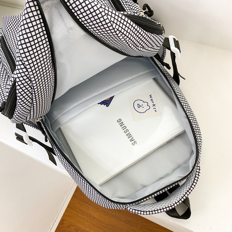 Schoolbag for female college students, a niche design backpack, a large capacity backpack with a checkered cartoon puppy for junior and senior high school students Application Scenario