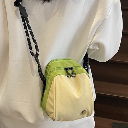 Waterproof color-blocking fabric bag for women, 2025 new style simple hand-held shoulder commuter bag, lightweight travel backpack, crossbody bag full figure