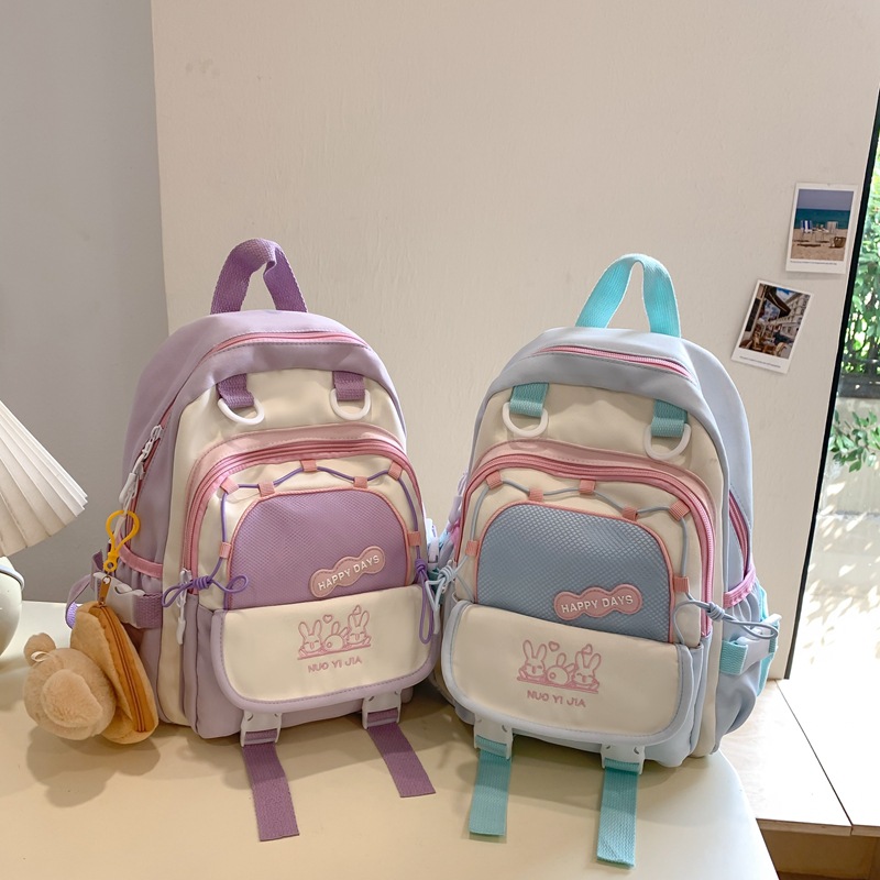 The new 2025 schoolbag with a school style and contrasting colors is a lightweight and mini backpack. It's a cute and fresh girl's backpack Application Scenario