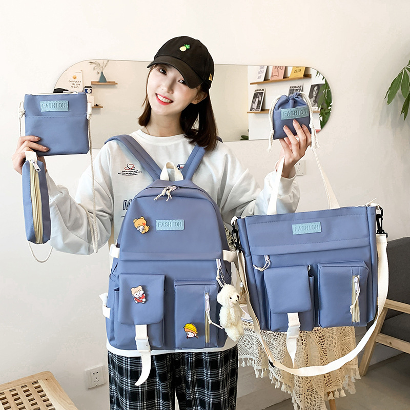 A new cross-border backpack for female college students, a five-piece set of Korean-style contrasting color canvas schoolbag for junior high school students full figure
