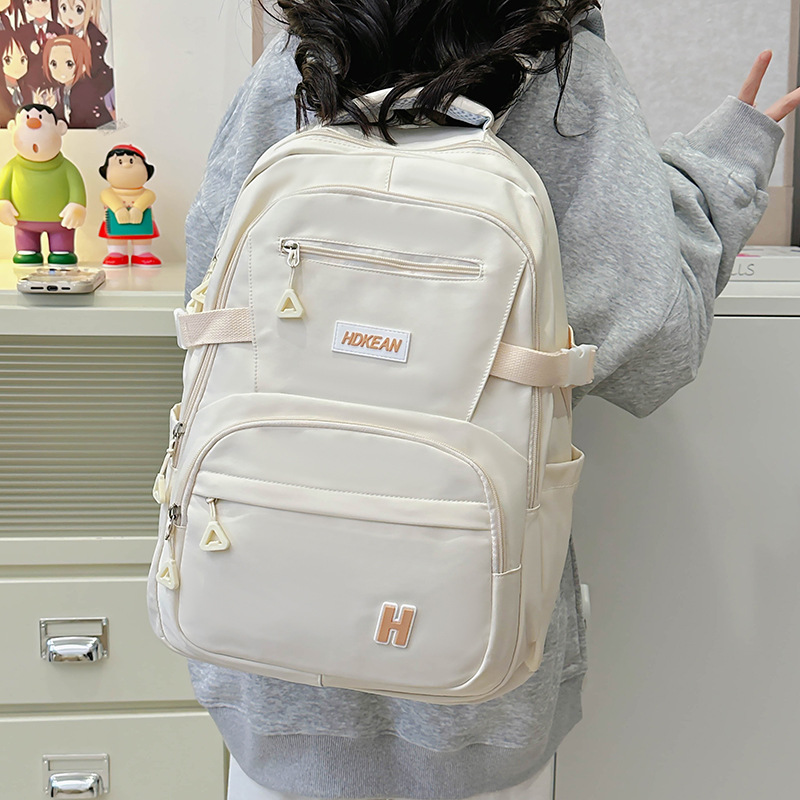 The 2024 new large-capacity backpack for high school students with multiple compartments and wide shoulder straps for primary and secondary school students is versatile for men details Picture