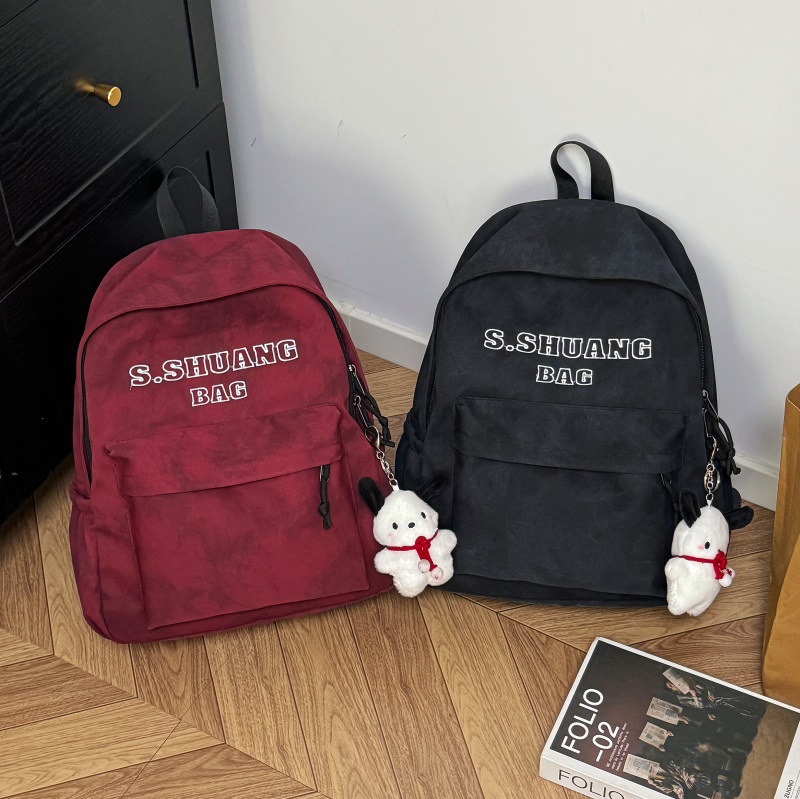 Japanese Harajuku retro letter backpack 2025 New Korean version simple and versatile student schoolbag with large capacity for women full figure