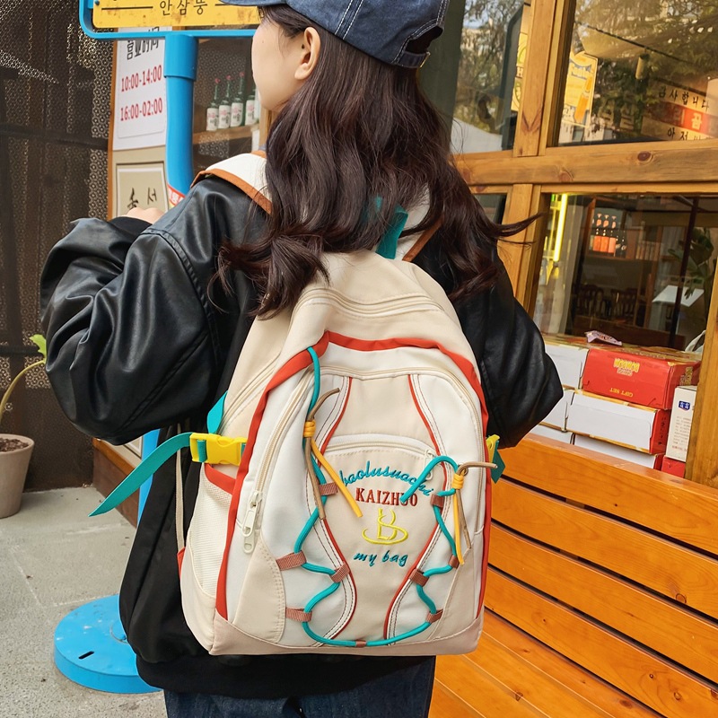 Cross-border niche color-blocking backpack, large-capacity schoolbag for female college students, junior and senior high school students, cute travel backpack Application Scenario