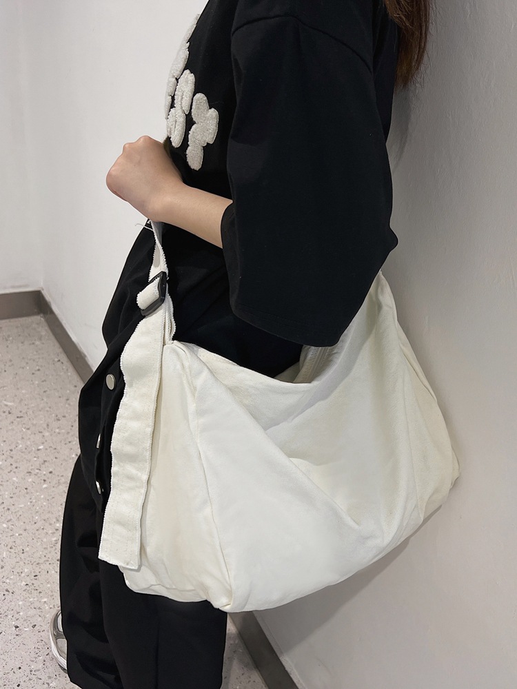 Japanese-style washed canvas single-shoulder bag for women, 2024 new ins solid color, simple and retro, casual crossbody bag for college students details Picture