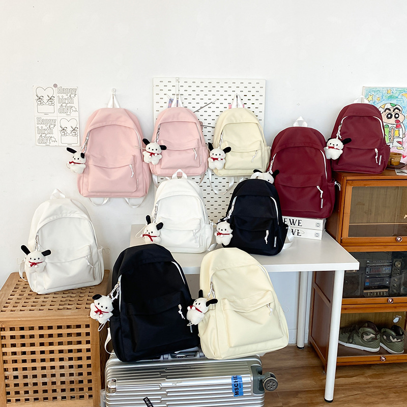 New cross-border schoolbag: Simple and large-capacity backpack for college students, casual solid-color backpack for high school and junior high school students full figure