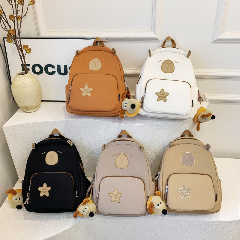 The new fashionable and simple schoolbag has a high appearance level. It is a cute cartoon backpack with Japanese shoulders for children and primary school students to go out for leisure details Picture