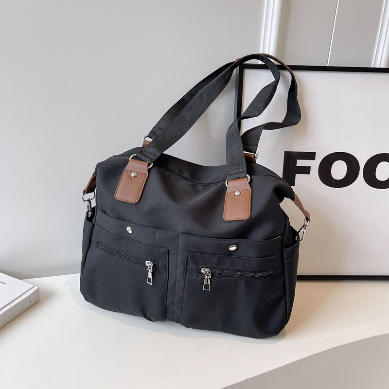 Large-capacity fashionable commuter tote bag 2025 new style canvas versatile shoulder bag trendy casual travel handbag full figure