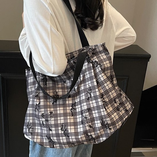 A new Korean floral bucket bag for women, a versatile single-shoulder bag for commuting and a artistic large-capacity tote bag for women Specification drawing