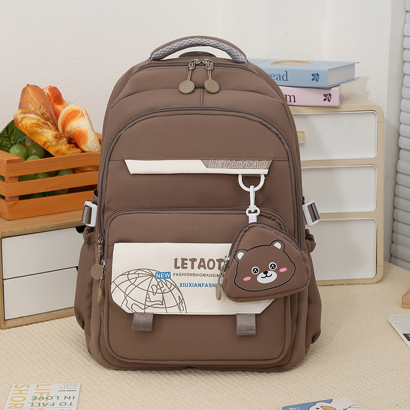 New lightweight and lightweight backpack for junior high school students, female primary school students in grades three, four and five, large-capacity color-blocking backpack details Picture