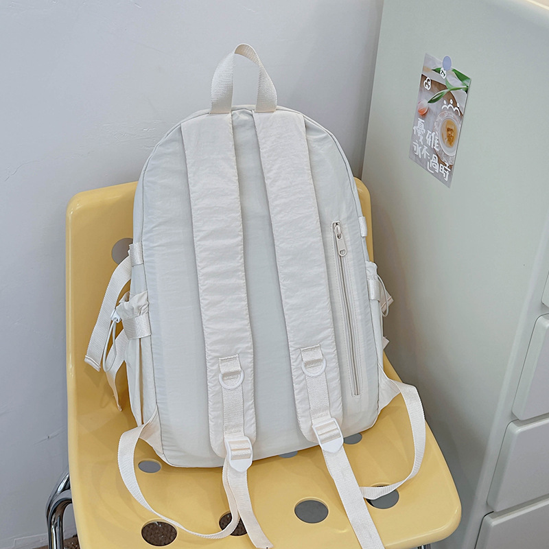 This backpack is light and versatile for women, with a laid-back style. It has a high level of appearance and a drawstring. It is a large-capacity travel backpack and a school bag for college students Specification drawing
