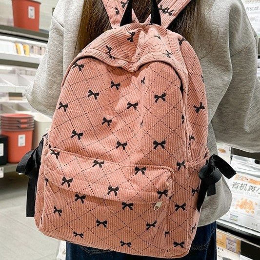 A new and versatile large-capacity student backpack with a fresh bow bow for autumn and winter full figure