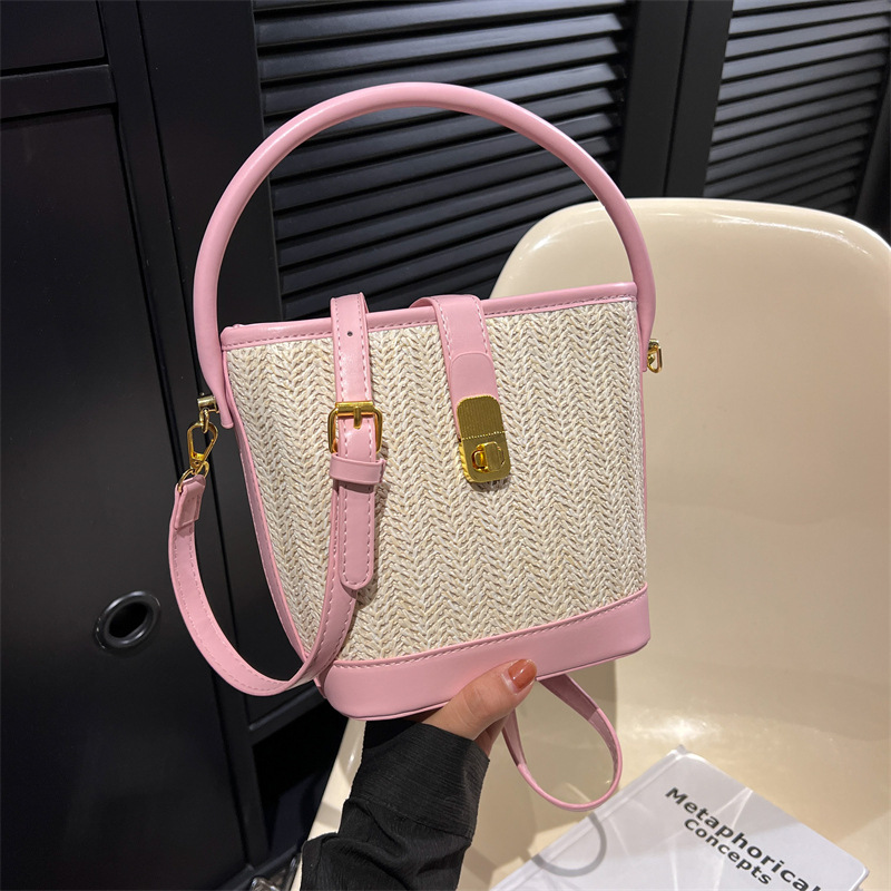 The 2024 new straw-woven bag for women is a trendy solid-color niche design crossbody bag and a versatile hand-held bucket bag Specification drawing