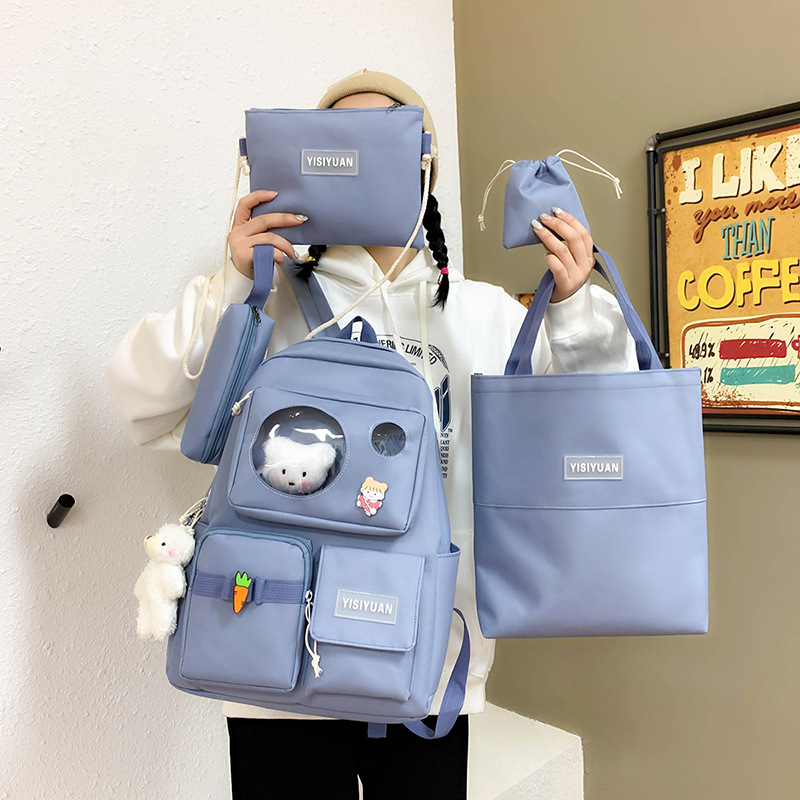 New Korean version bear doll girls' backpack five-piece set canvas junior high school girls' backpack full figure