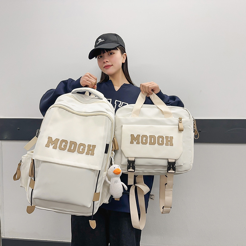 New Korean version large-capacity backpacks with letters for both men and women are available in spring. This two-piece set is a versatile backpack for junior and senior high school students Specification drawing