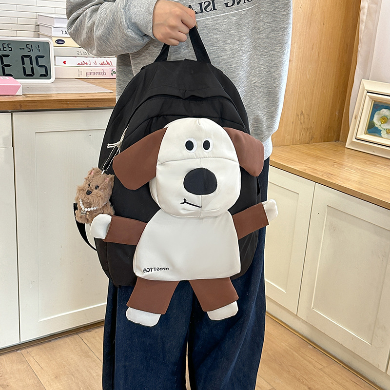 A sweet and cute cartoon dog backpack for girls, a new 2024 campus primary school student backpack with large capacity details Picture