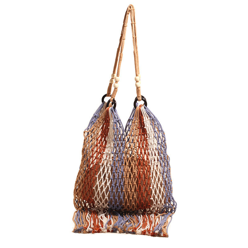 New straw woven bag, cotton rope handbag, cross-cut hollowed-out women's bag, beach bag, single-shoulder fashionable hollowed-out tassel underarm bag Item Picture
