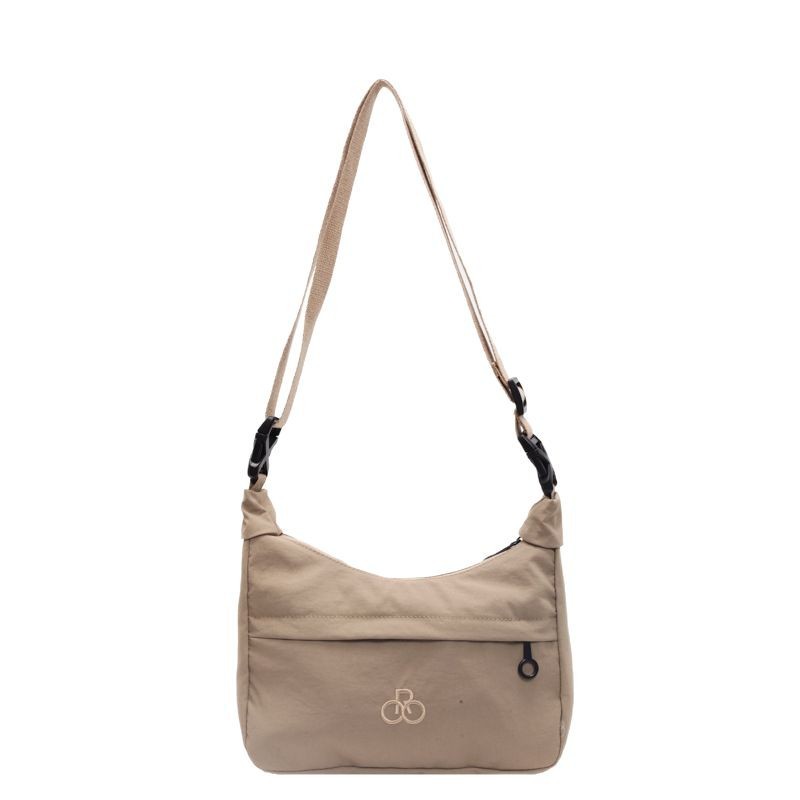 Fashionable and casual saddle Bag 2025 Spring New Korean-style trendy fabric bag, outdoor light and simple crossbody bag Item Picture