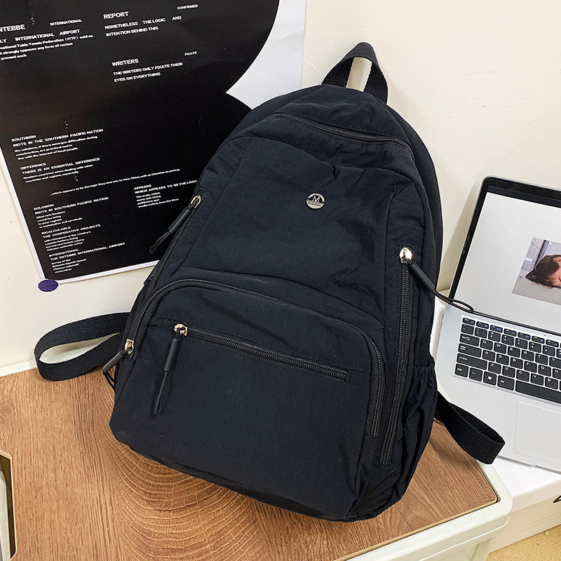 Simple outdoor travel backpack, ins women's backpack design sense, solid color backpack for junior high school, senior high school and college, men's details Picture