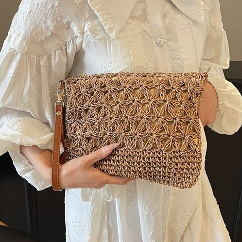 2025 Summer Leisure Vacation hollowed-out straw woven bag, forest-style, unique and stylish commuter single-shoulder bag, lightweight crossbody bag for women details Picture