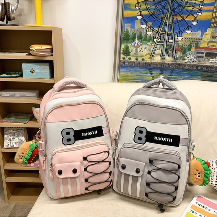 The new schoolbag is a large-capacity, lightweight, lightweight, spine-protecting, fashionable and versatile backpack for junior high school, senior high school and college students details Picture