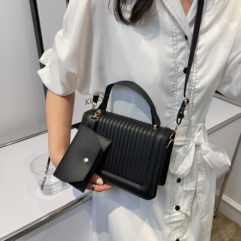 2022 New Summer stylish embossed vertical bar small square bag, simple and casual Korean-style hand-held shoulder crossbody bag details Picture