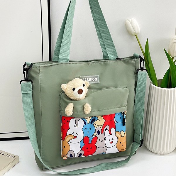 A cute Korean version of a schoolbag for junior high school students to relieve their burden, a cute cartoon single-shoulder bag for primary school students to take extra classes, and a cute one-shoulder bag for study Tours and autumn outings Specification drawing