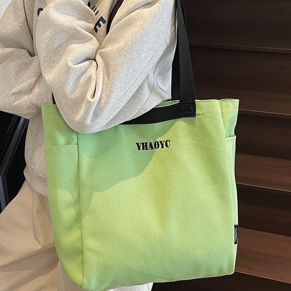 Popular new canvas bags for women's commuting to work, large-capacity single-shoulder bags, simple tote bags, and hand-held canvas bags for classes