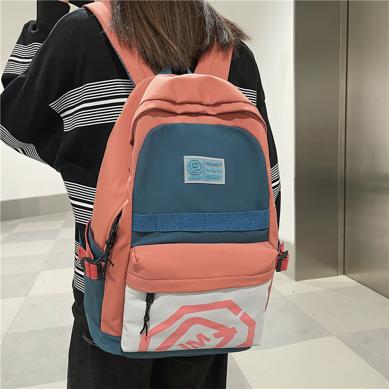 The new schoolbag with a large capacity for women, a Korean version with a Japanese forest style, is a fashionable and niche backpack that can be matched with junior high school, senior high school and college students full figure