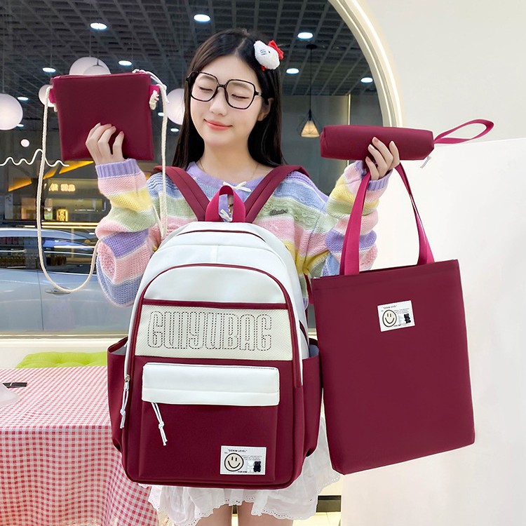New color-blocking school-style backpack for junior high school students, large-capacity four-piece schoolbag for primary school students, and lightweight commuting backpack full figure