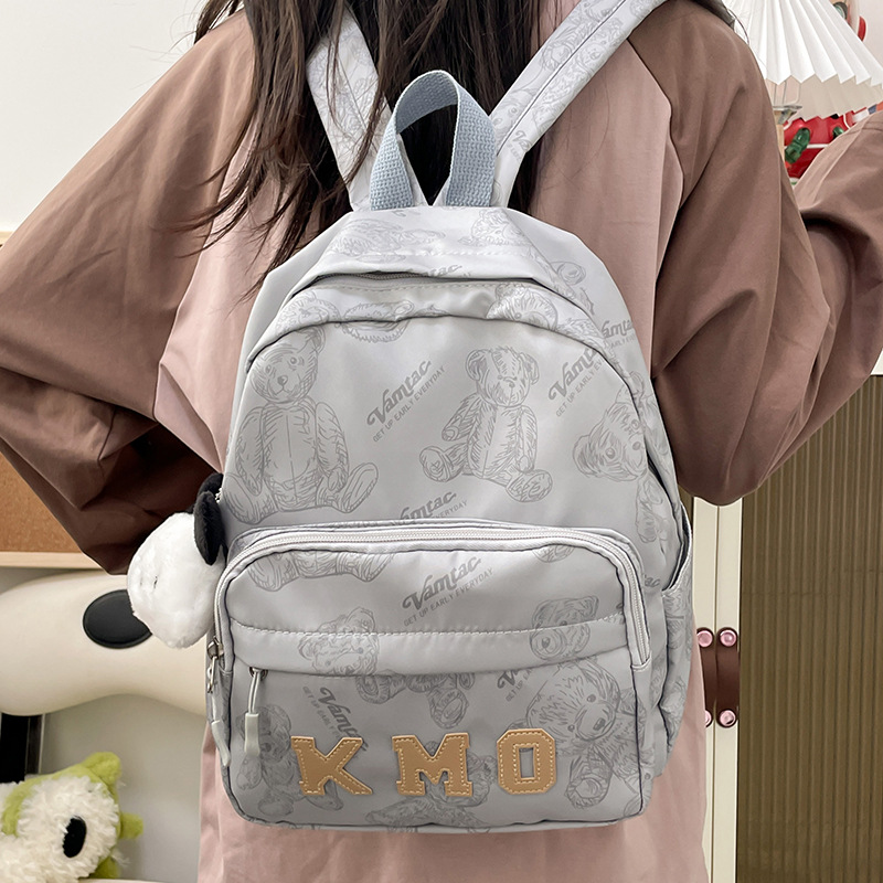 Cross-border schoolbag, niche design, primary school student printed backpack, simple bear backpack, lightweight travel backpack for going out Application Scenario