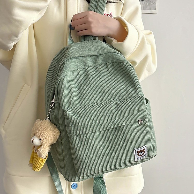 The new autumn/winter 2024 fashion girls' backpack, cute solid-colored small backpack, travel and study bag, corduroy backpack details Picture