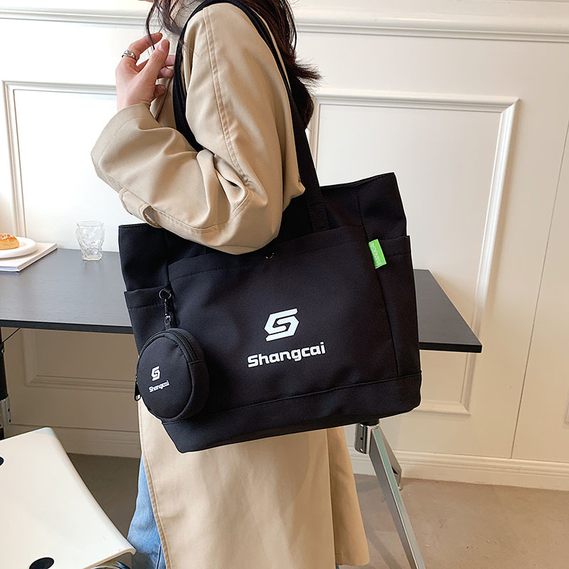 Tote bag, women's large-capacity hand-held shoulder bag, college student class bag, fashionable commuting bag, simple nylon canvas bag details Picture