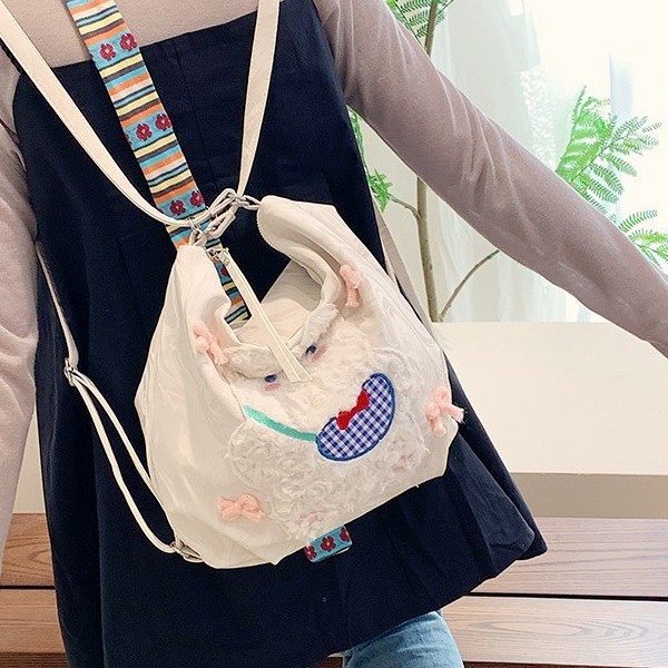 A new large-capacity plush cartoon fresh backpack for cute girls and a trendy multi-functional commuting crossbody bag details Picture