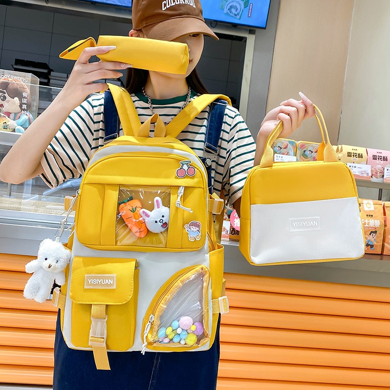 The new cross-border canvas backpack for girls, a fresh and color-blocking three-piece set, is a trendy school backpack for junior and senior high school students Application Scenario