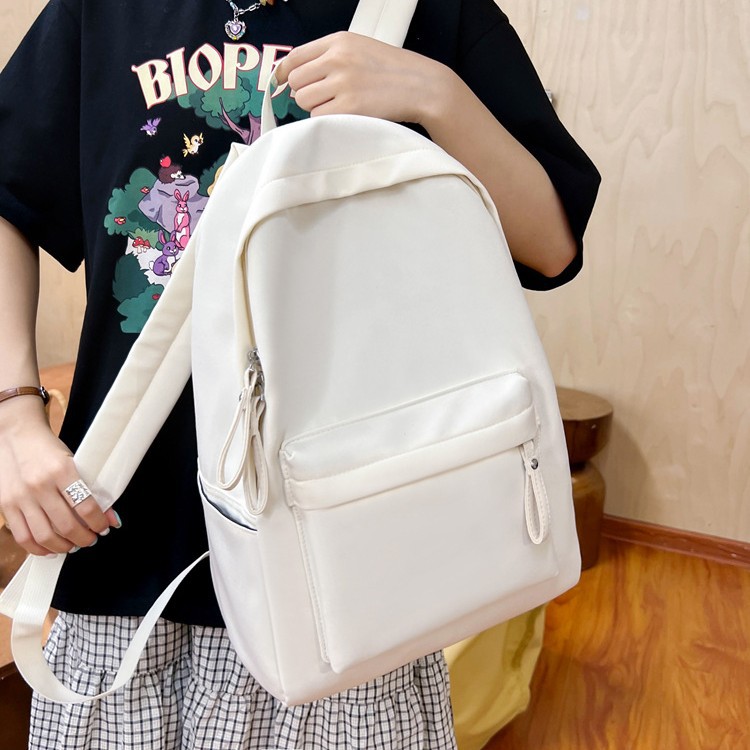 Wholesale of new minimalist and ultra-light black and white checkered canvas bags for girls, large-capacity backpacks for primary and secondary school students details Picture