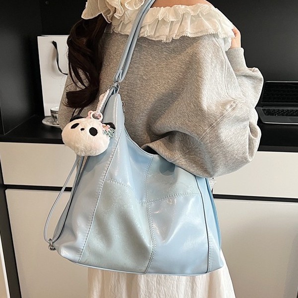 Women's bag 2025 Spring/Summer New commuter large-capacity tote bag, fashionable and versatile, retro bucket, fresh soft bag, cross-border details Picture