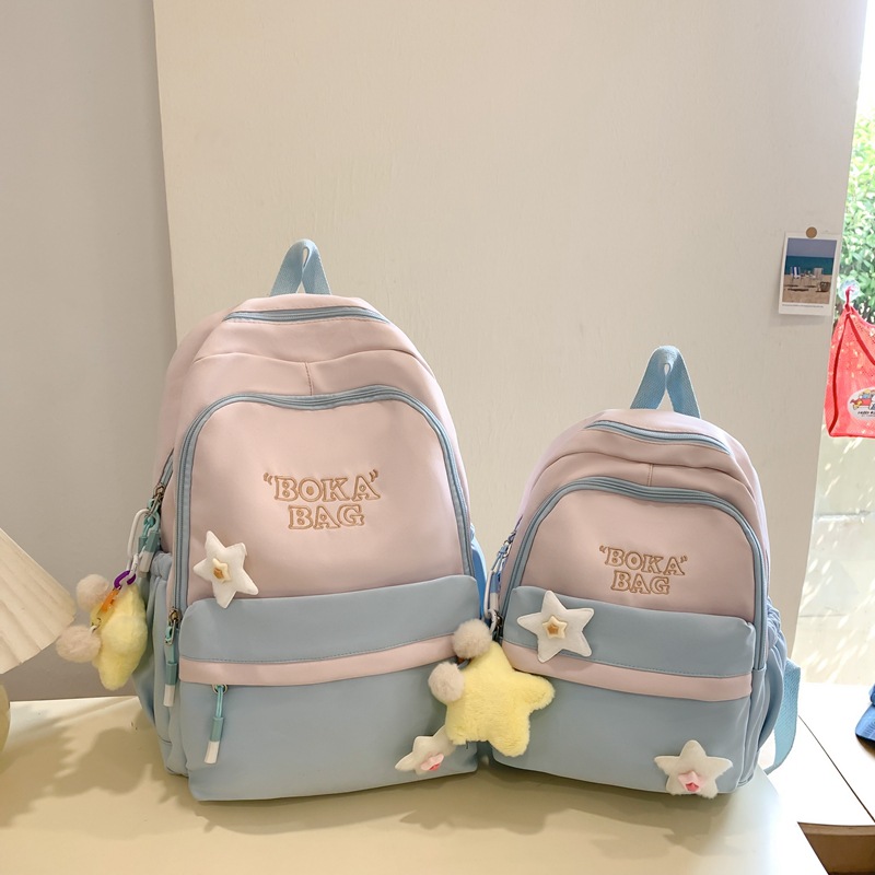 Cross-border high-appearance-level schoolbag, large-capacity color-blocking campus backpack, Korean-style fresh and clean backpack for primary, middle and high school students full figure