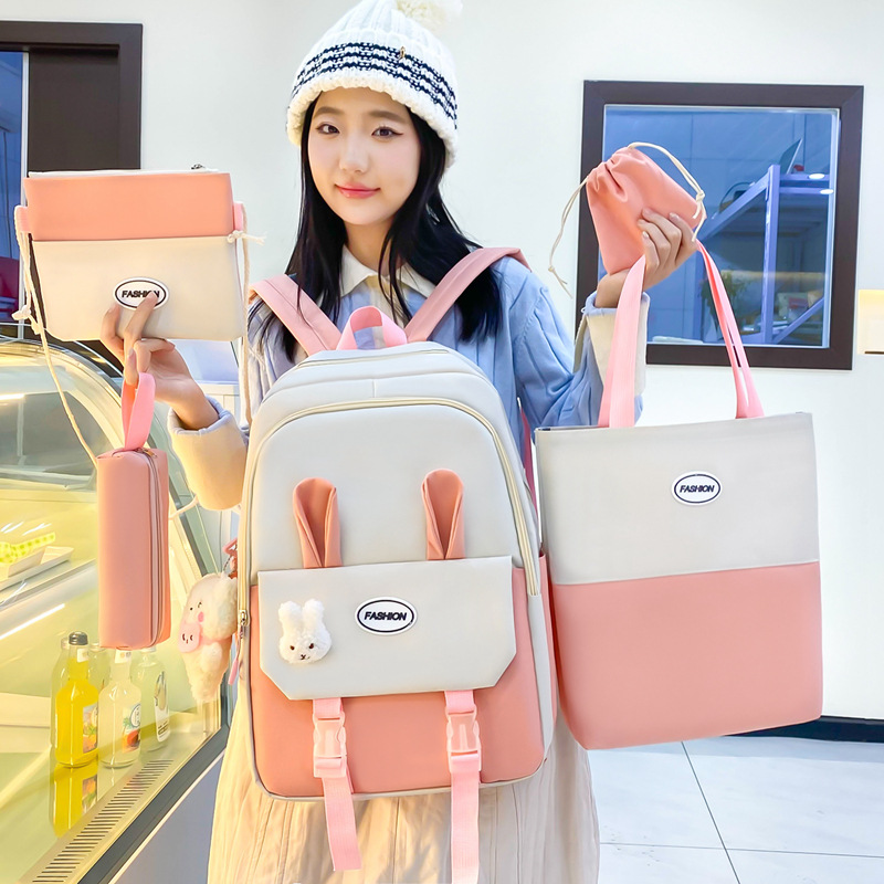 Cross-border supply of cute schoolbags, large-capacity casual backpacks for primary and secondary school students, five-piece set, little rabbit children's backpacks full figure