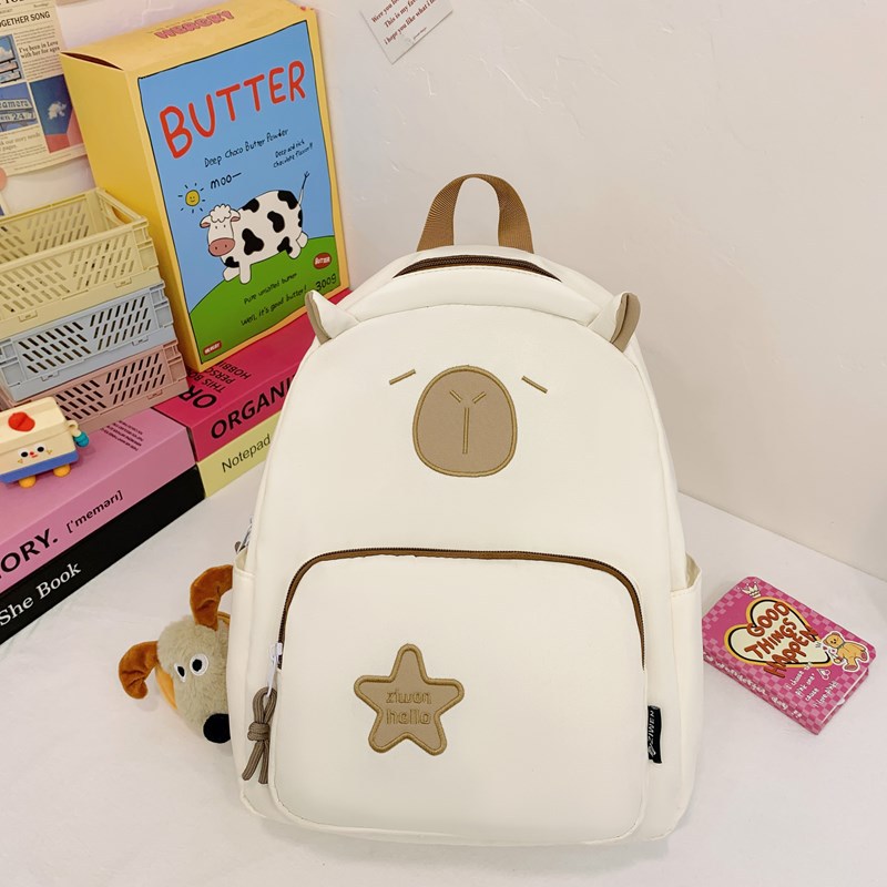 The new fashionable and simple schoolbag has a high appearance level. It is a cute cartoon backpack with Japanese shoulders for children and primary school students to go out for leisure full figure