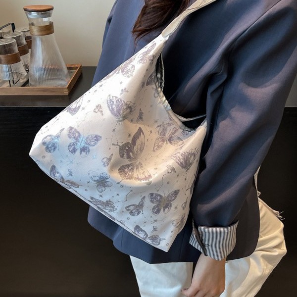 The 2025 new style of stylish and elegant design, single-shoulder crossbody, stylish butterfly, retro and fresh, underarm texture handbag details Picture